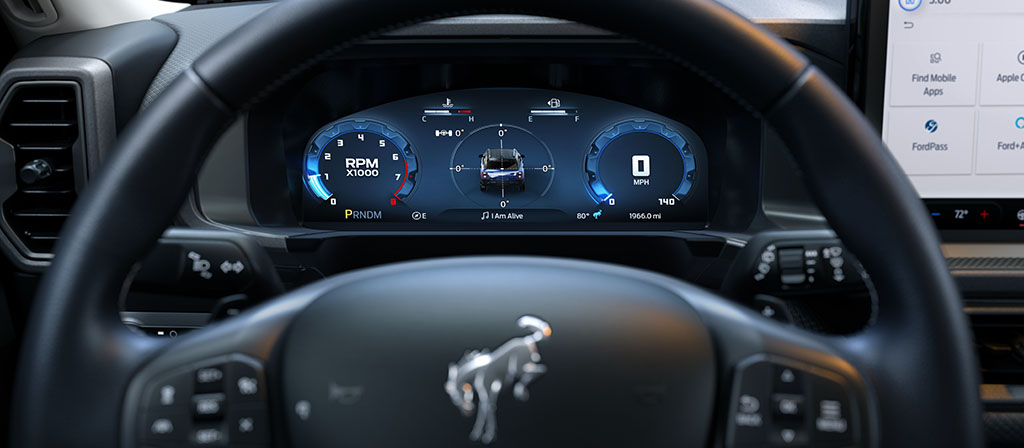 2026 Ford Bronco Sport® SUV interior showing the instrument cluster display, steering wheel, and centre display
