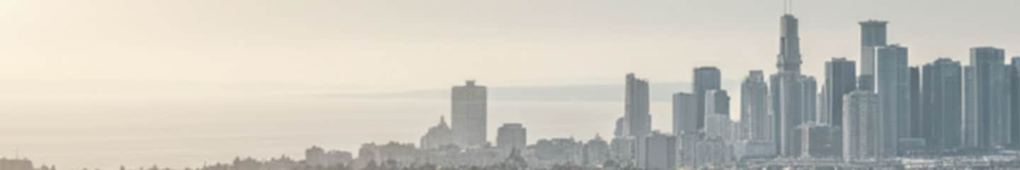 City skyline next to a large body of water