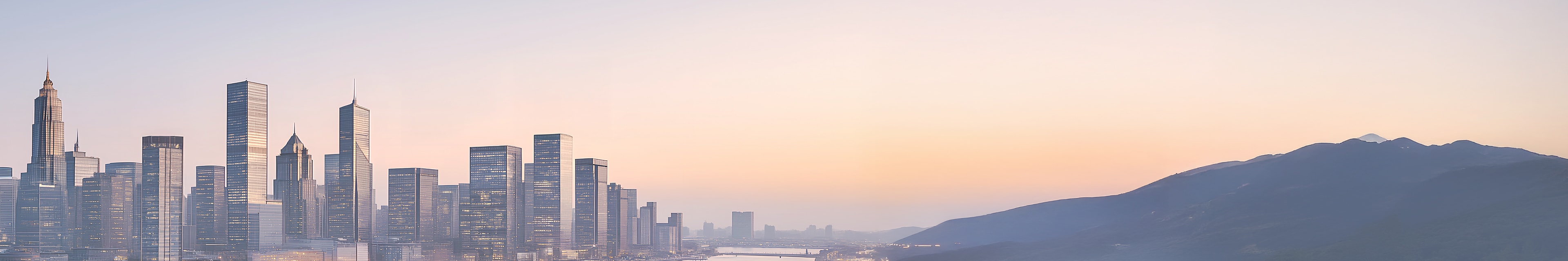 Cityscape with fog set against the mountains