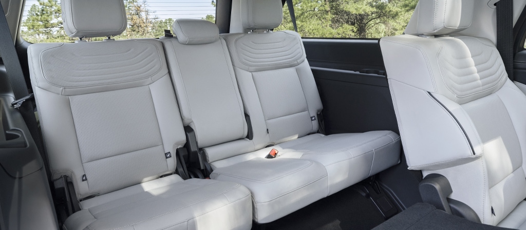 2025 Ford Expedition® Platinum® SUV rear seating area with a seat folded flat