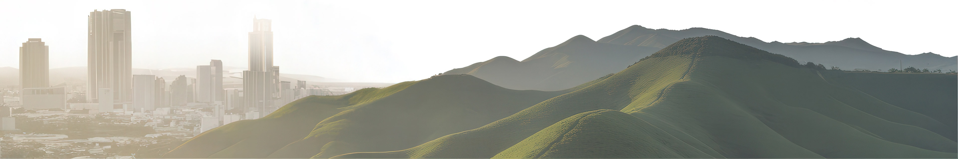 Rolling hills with a city in the background