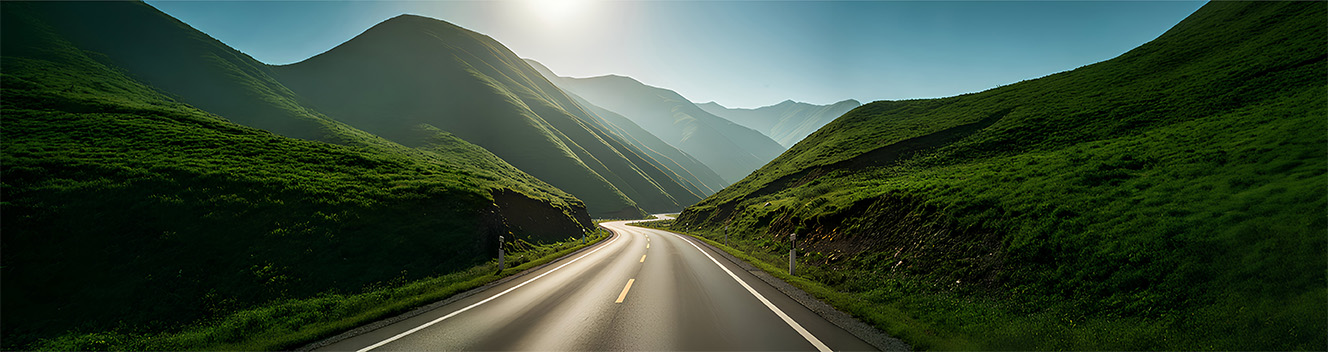 A road with mountains on both sides