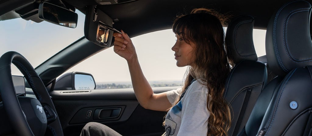 Person sitting in a 2025 Ford Mustang® Dark Horse™ coupe