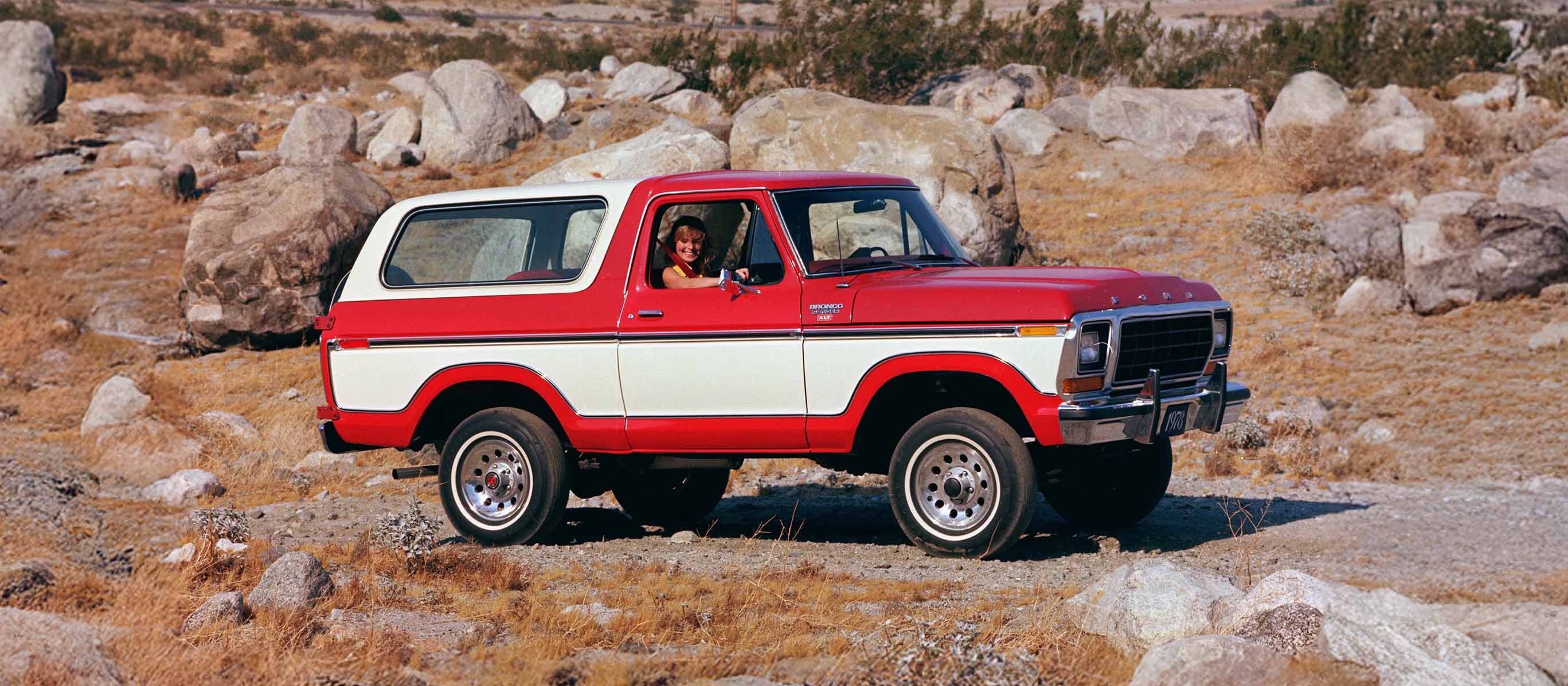 1978 Bronco parked on a gravel road.