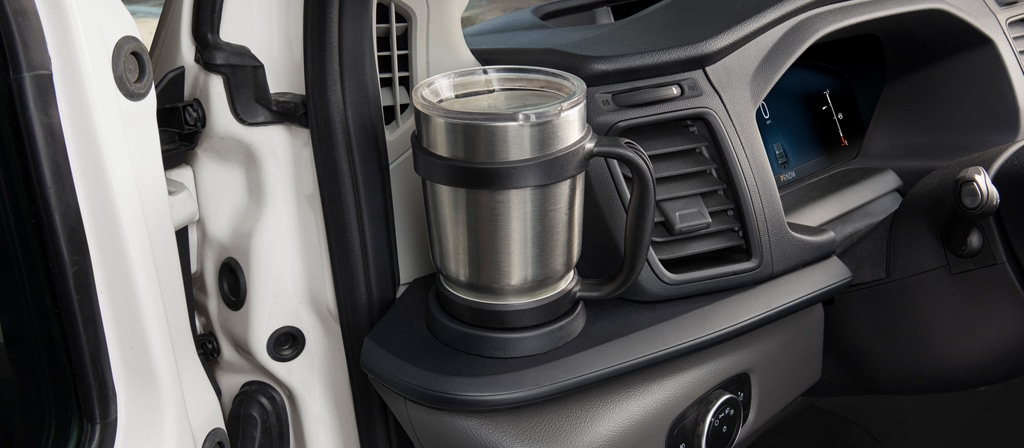 Cup holder inside a 2026 Ford Transit® van driver's side door