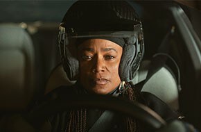 Close-up of Dee Bryant wearing a crash helmet