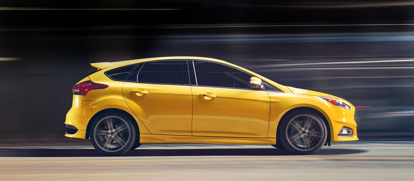 A yellow Ford Focus