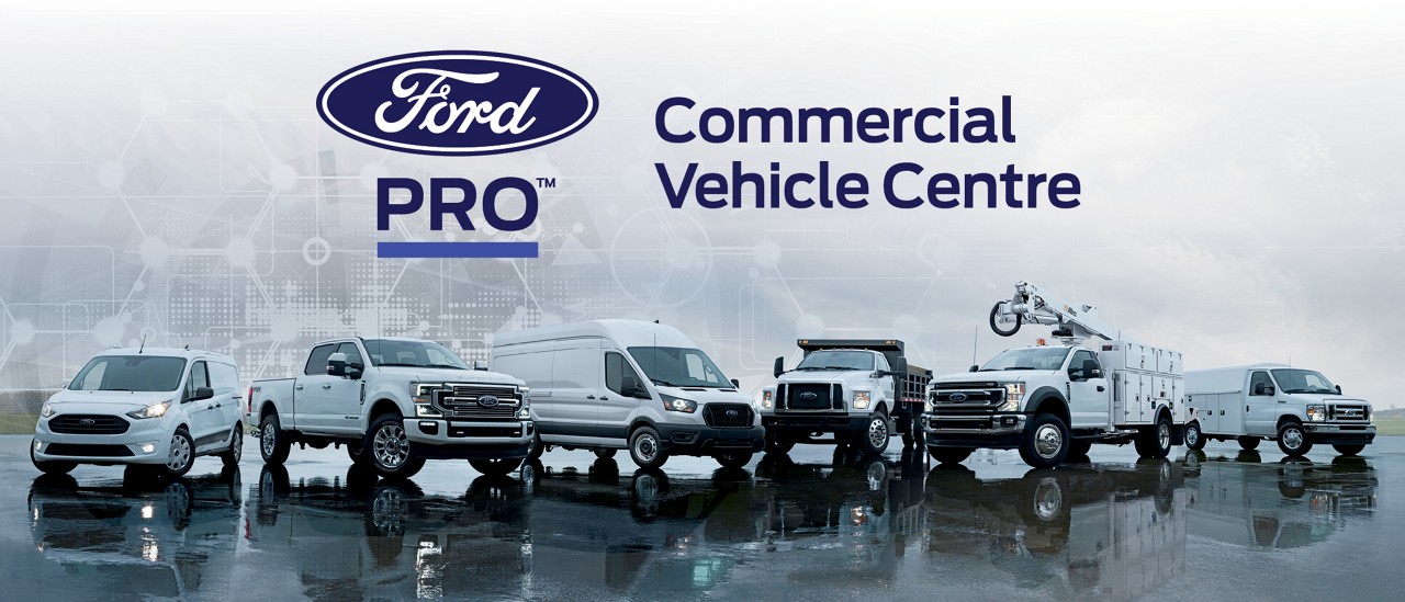 Ford COmmercial Vehicle Centre. Lineup of 5 Ford Commercial vehicles at a construction site.