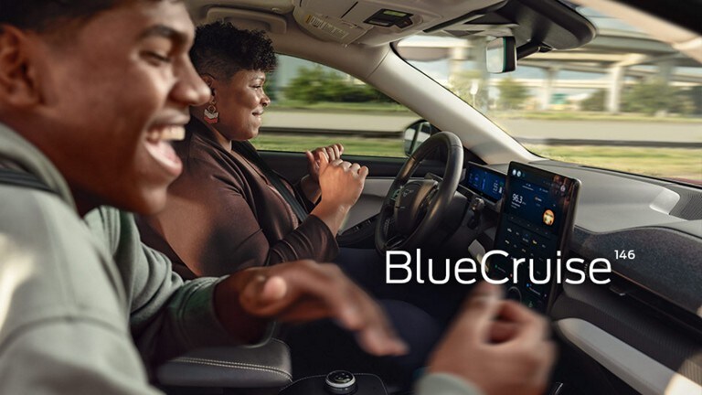 Interior view of a person driving hands-free with BlueCruise.
