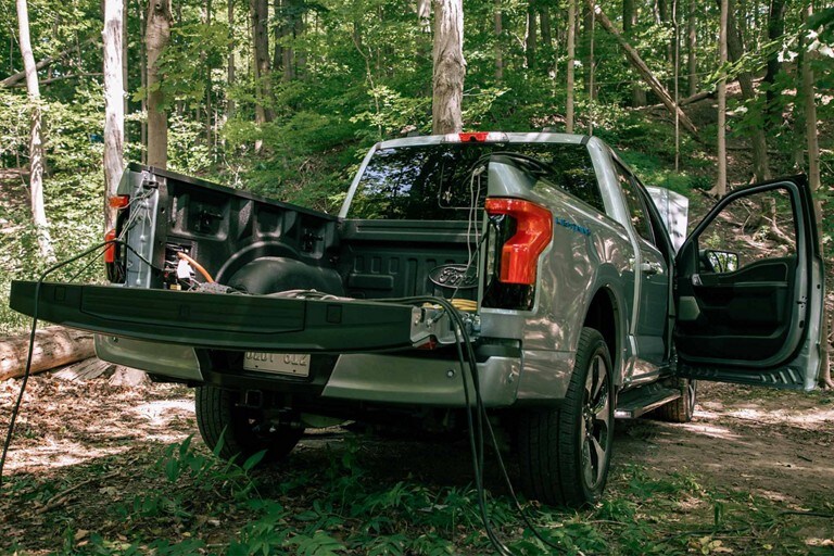 Three quarter view of a silver Ford f 1 50 Lightning.