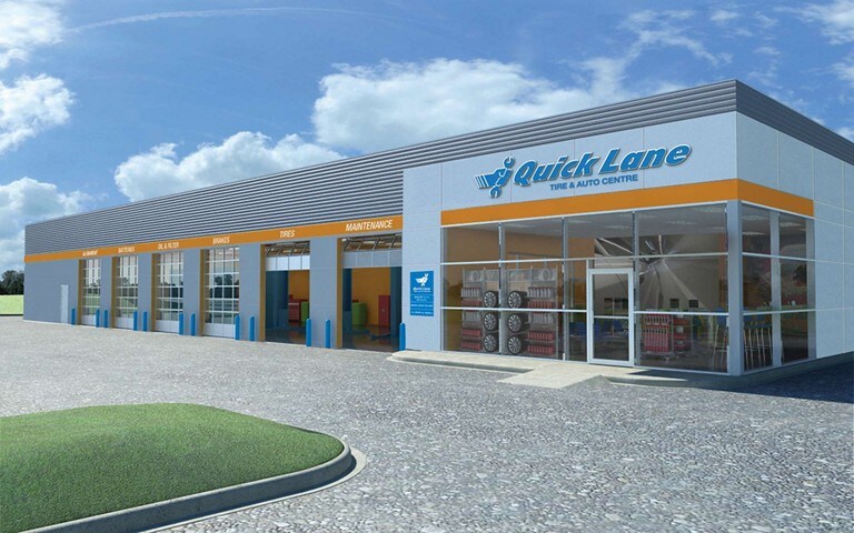 A Quick Lane auto centre and parking lot