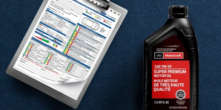 Vehicle report card and an oil bottle