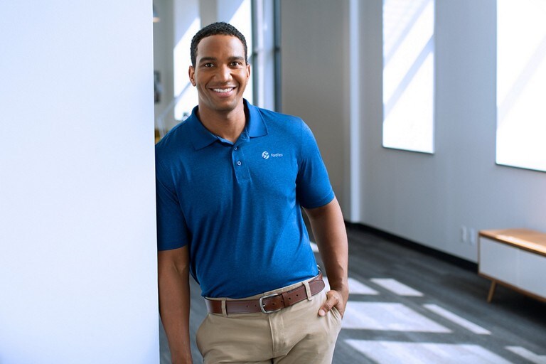 Ford employee standing by at an office