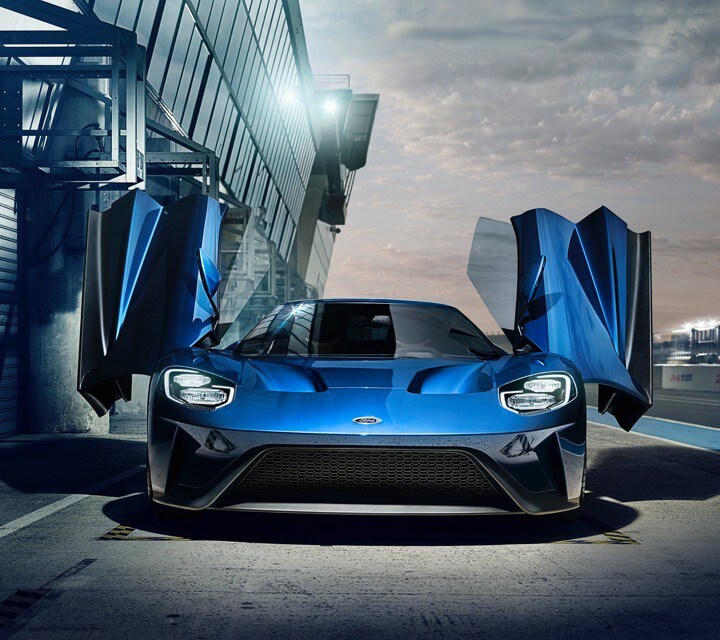 Ford G T at Le Mans racetrack with doors open in pit