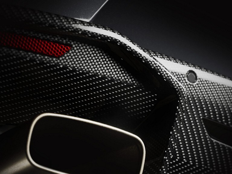 Close up of the 2025 Mustang® GTD carbon fiber bumper and metal exhaust tip.