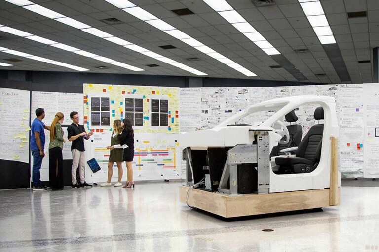 Team performing ideation exercise for future vehicles