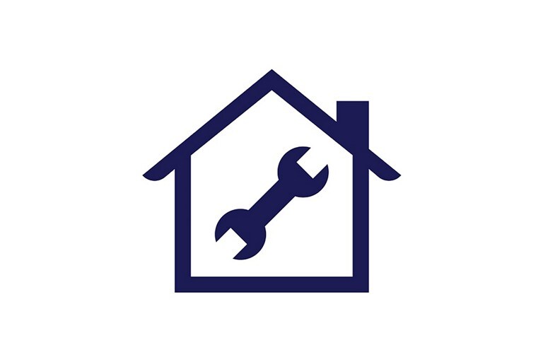 Icon of a house with a wrench inset
