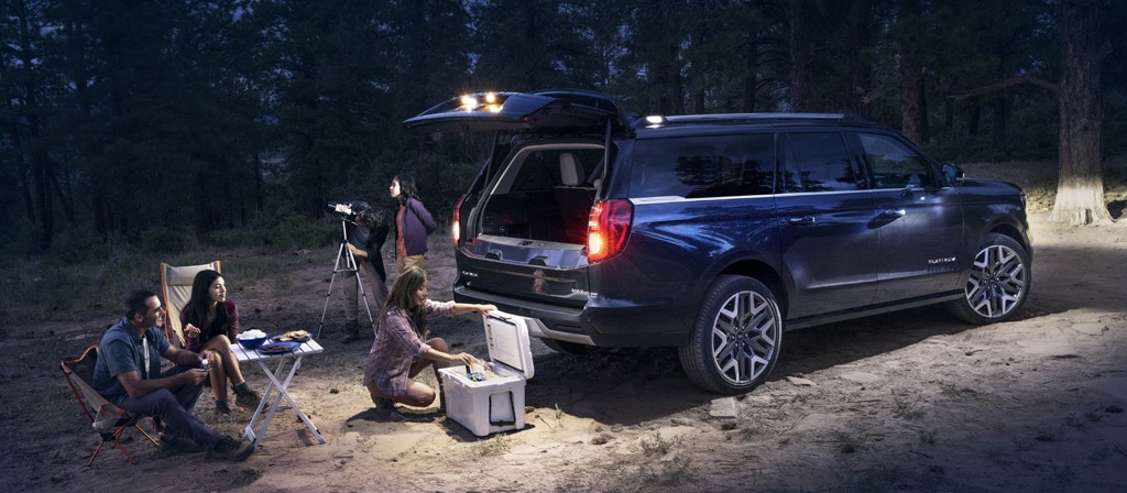 2025 Ford Expedition® SUV with available 360-Degree Zone Lighting with people nearby