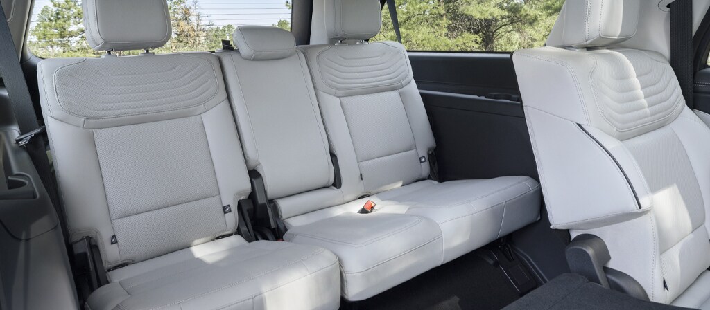 2025 Ford Expedition® Platinum® SUV rear seating area with a seat folded flat