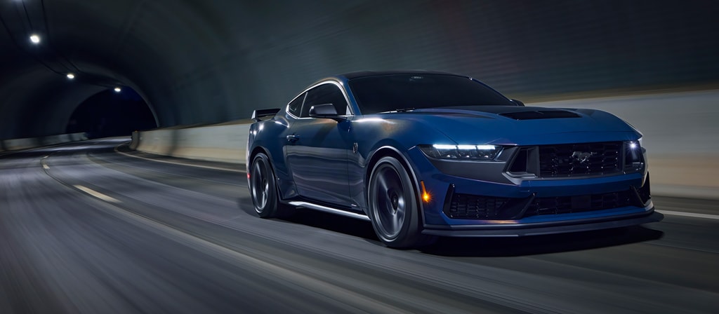 2026 Ford Mustang Dark Horse® fastback being driven in a tunnel