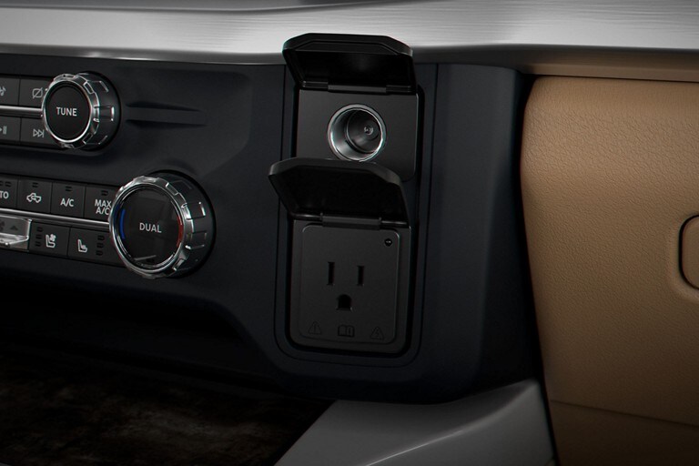 Available 110-volt 400-watt A/C power inverter shown in the console of the truck