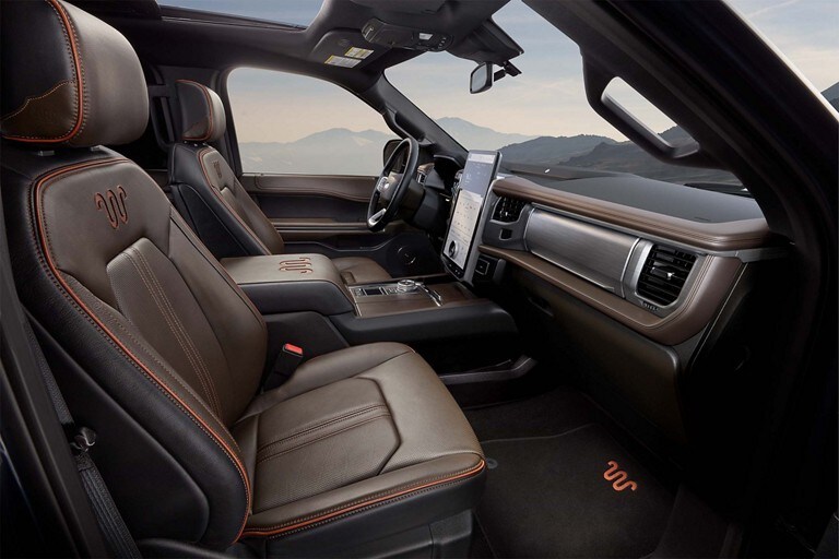 Interior image of the leather seating and console in a 2024 Ford Expedition® King Ranch® model