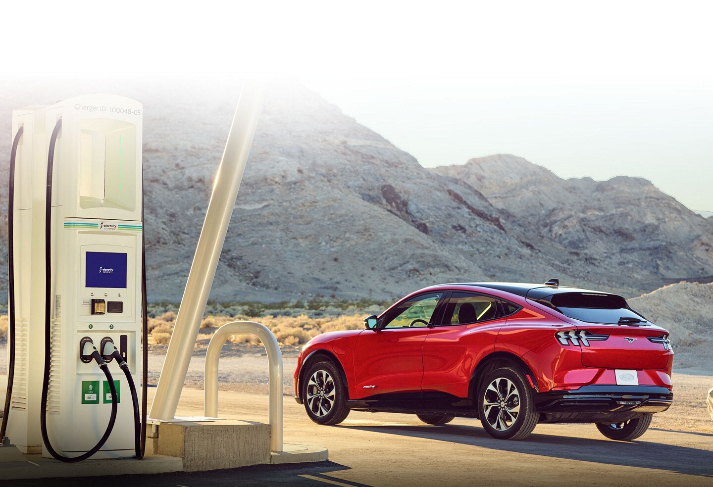 A 2023 Ford Mustang Mach-E parked at a charging station