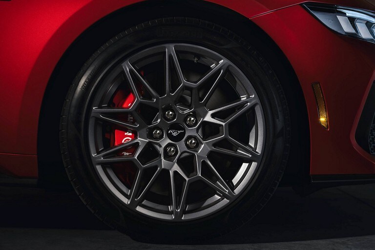 2024 Ford Mustang® model with a close-up of a wheel and brake caliper