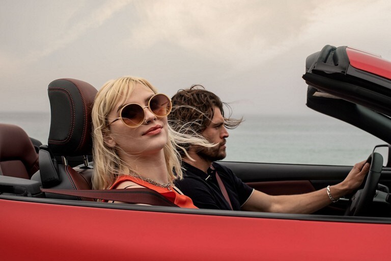 Two people in a 2024 Ford Mustang® convertible model