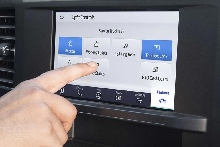 Person using the 8-inch touchscreen display