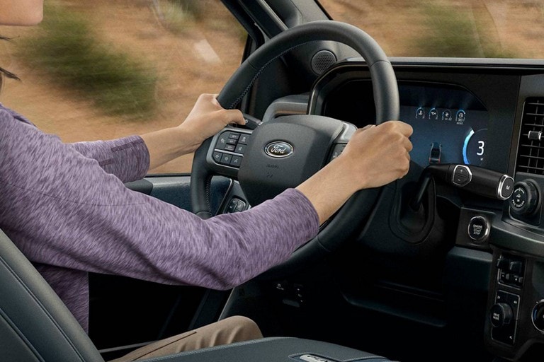 A person driving a 2025 Ford Super Duty® F-450® Limited model