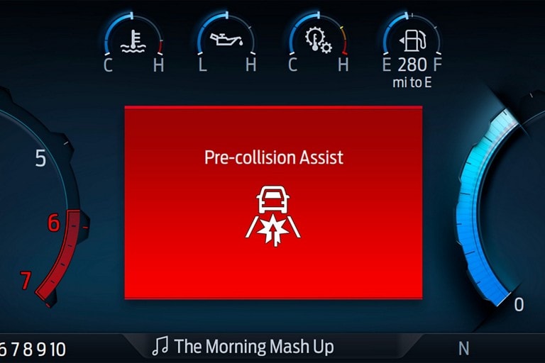 Close-up of the pre-collision assist icon in the instrument cluster