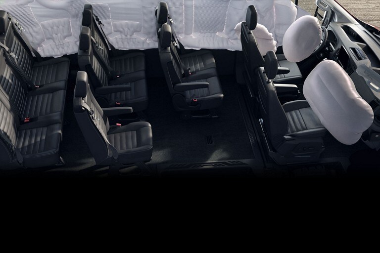 View of interior of a 2023 Ford Transit® Van with the airbags deployed