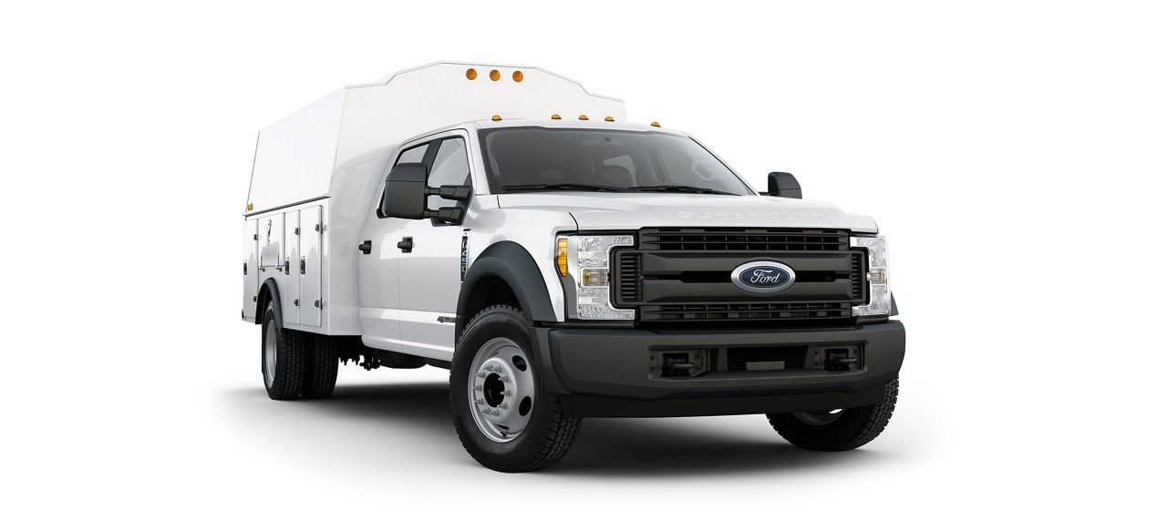 White modified Ford Chassis Cab