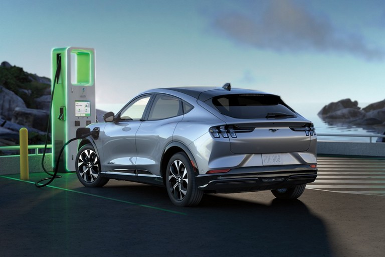 Mustang Mach-E plugged in to a public charging station.