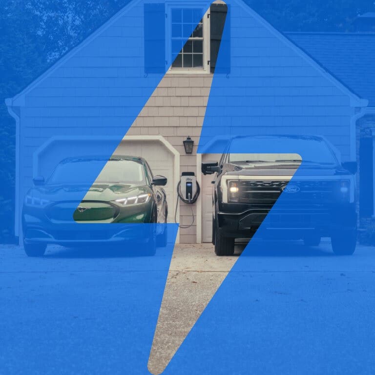 A 2024 Mustang Mach-E and a 2024 F-150 Lightning parked in a driveway