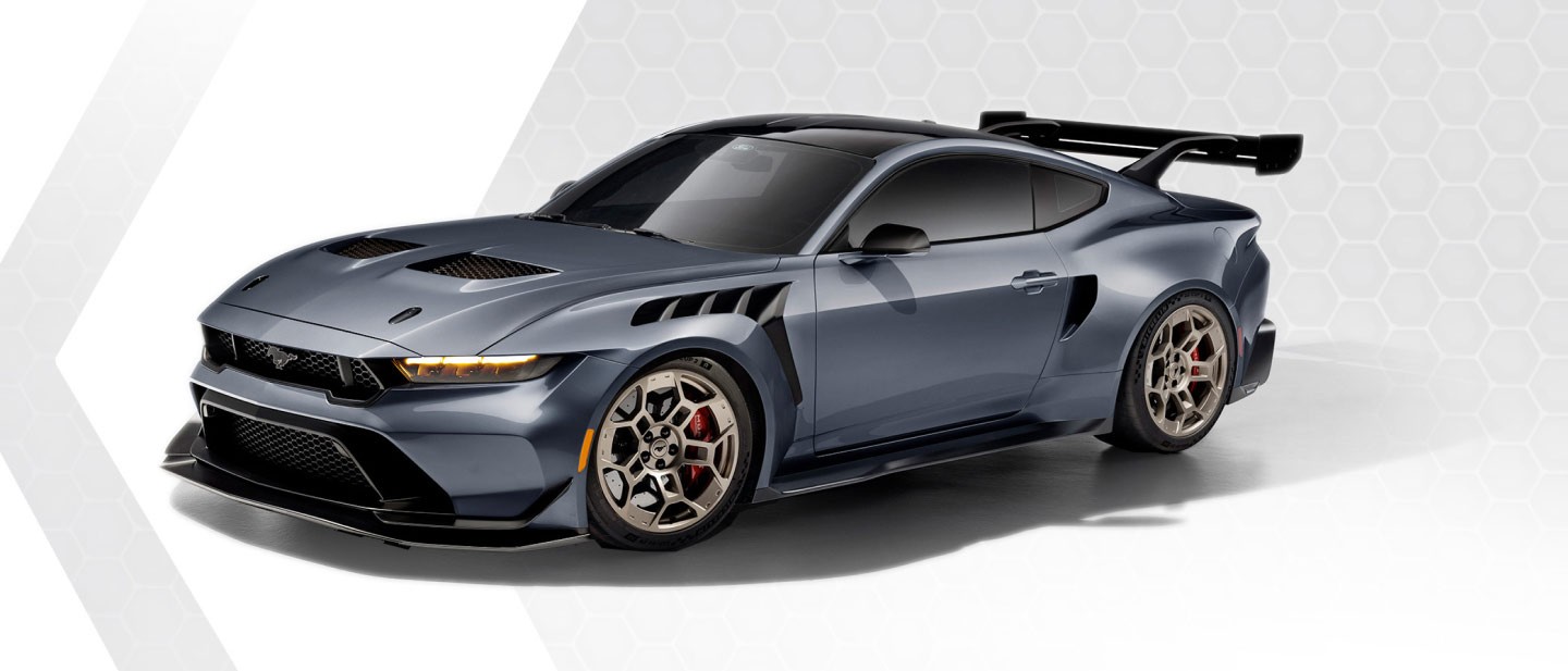 Three-quarter front view of a Mustang® GTD set against a honeycomb graphic background