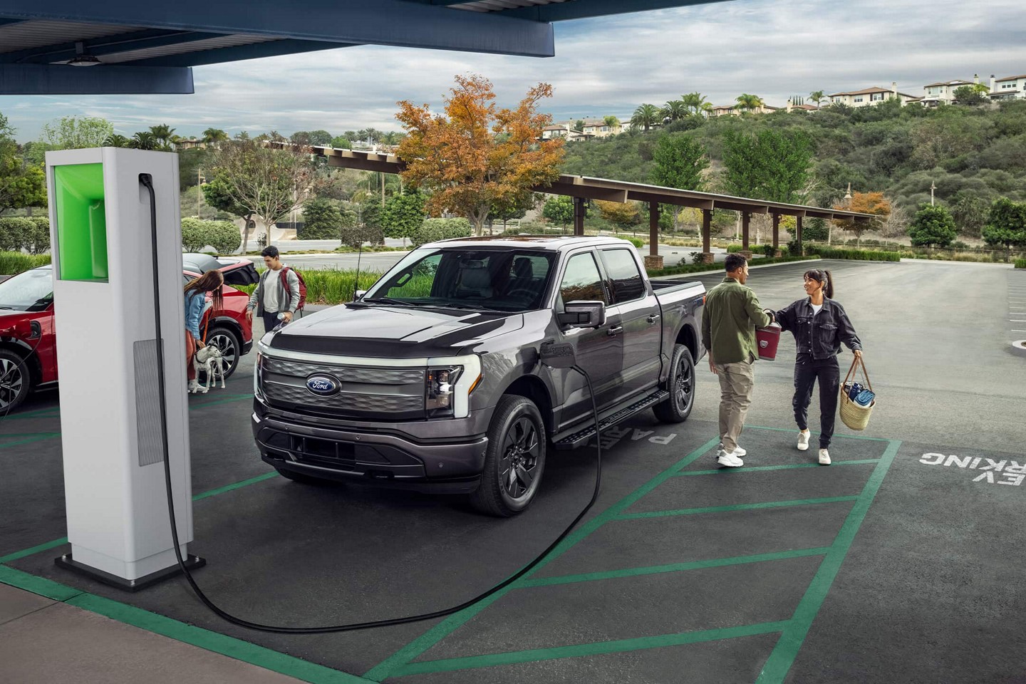 F-150 Lightning charging at a public charging station.