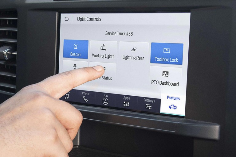 Interior of a 2025 Ford Super Duty® showing the touchscreen being used