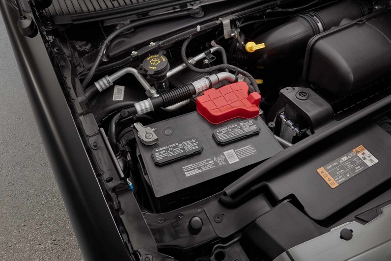 Close-up of the Maintenance-Free 78 Amp-Hr Battery on 2026 Ford E-Series Stripped Chassis
