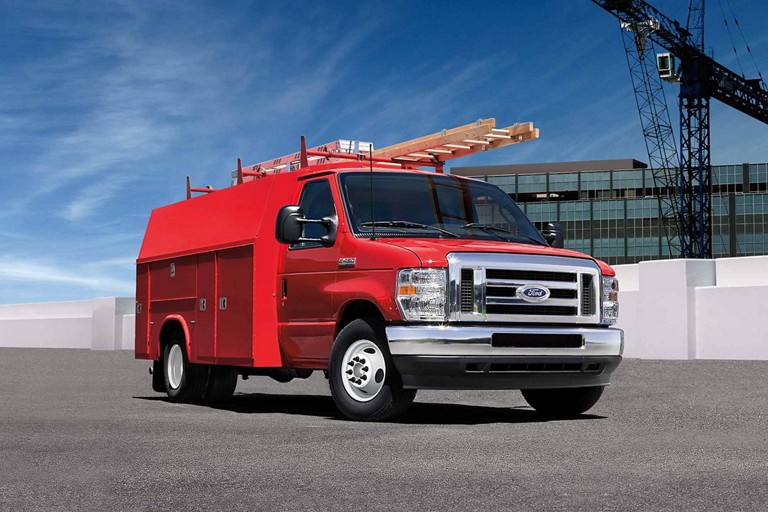 2026 Ford E-Series Cutaway with upfit contractors body hauling a ladder