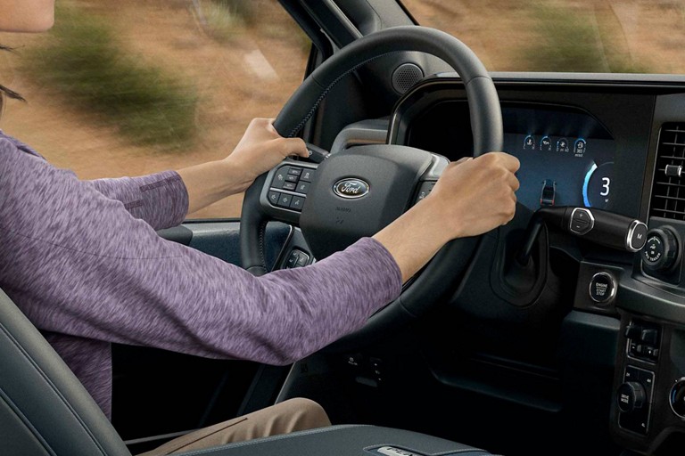 A person driving a 2025 Ford Super Duty® F-450® Limited model