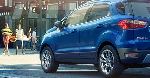 2020 Ford EcoSport Titanium in Lightning Blue stopped at city intersection