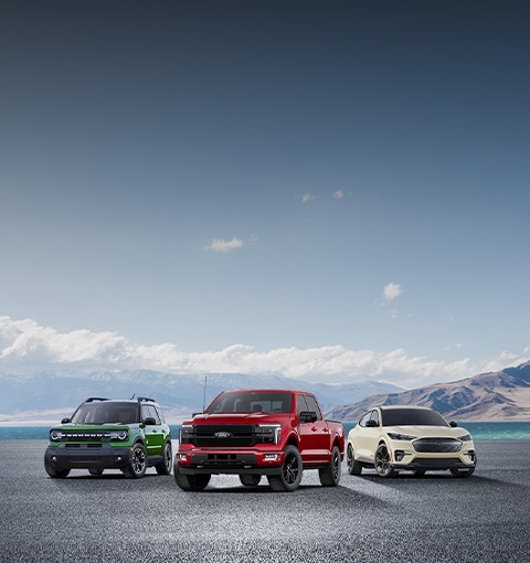 The lineup of Ford vehicles is shown from left to right: Escape, Bronco Sport, F-150, Mach-E, and Explorer.