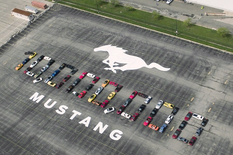 Ford® Mustangs arranged in the shape of ten million