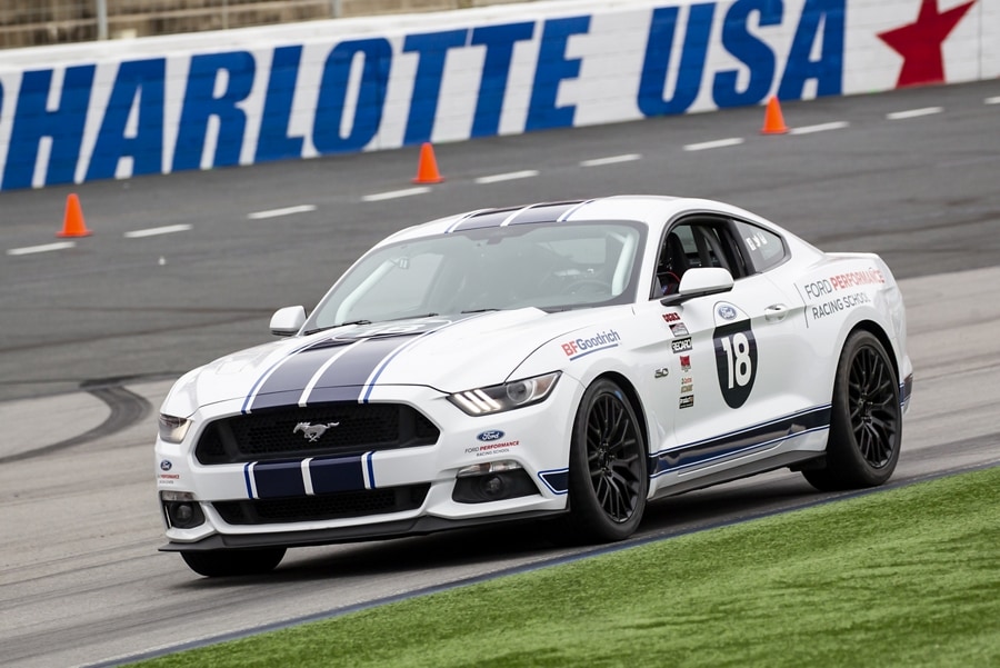 A 2021 Ford® Mustang being driven on a track