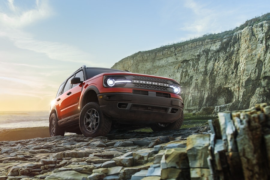 2023 Ford Bronco® Sport SUV Badlands® in Hot Pepper Red parked on a beach
