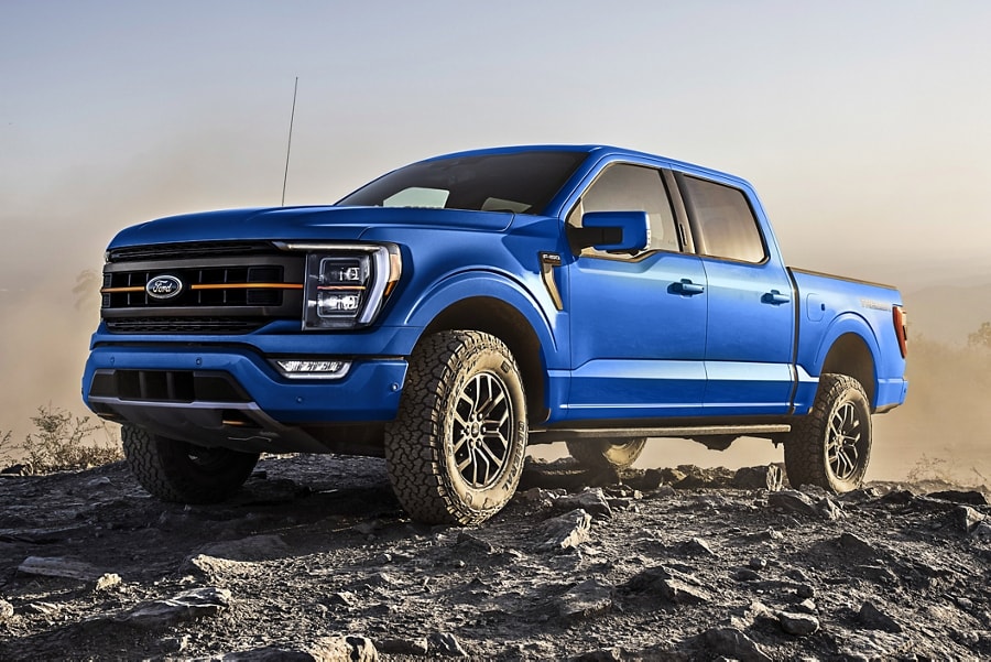 2022 Ford F-150® Tremor® in Velocity Blue parked on a rocky trail