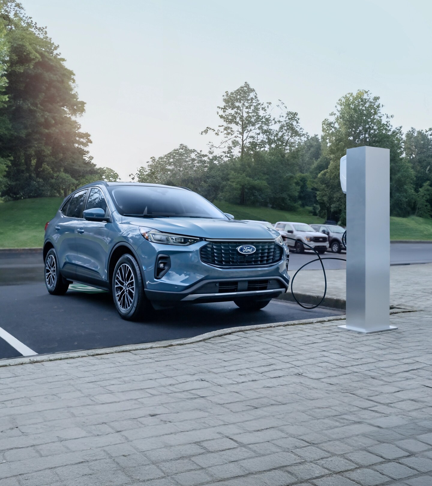 Ford Escape plugged in to a public charging station.