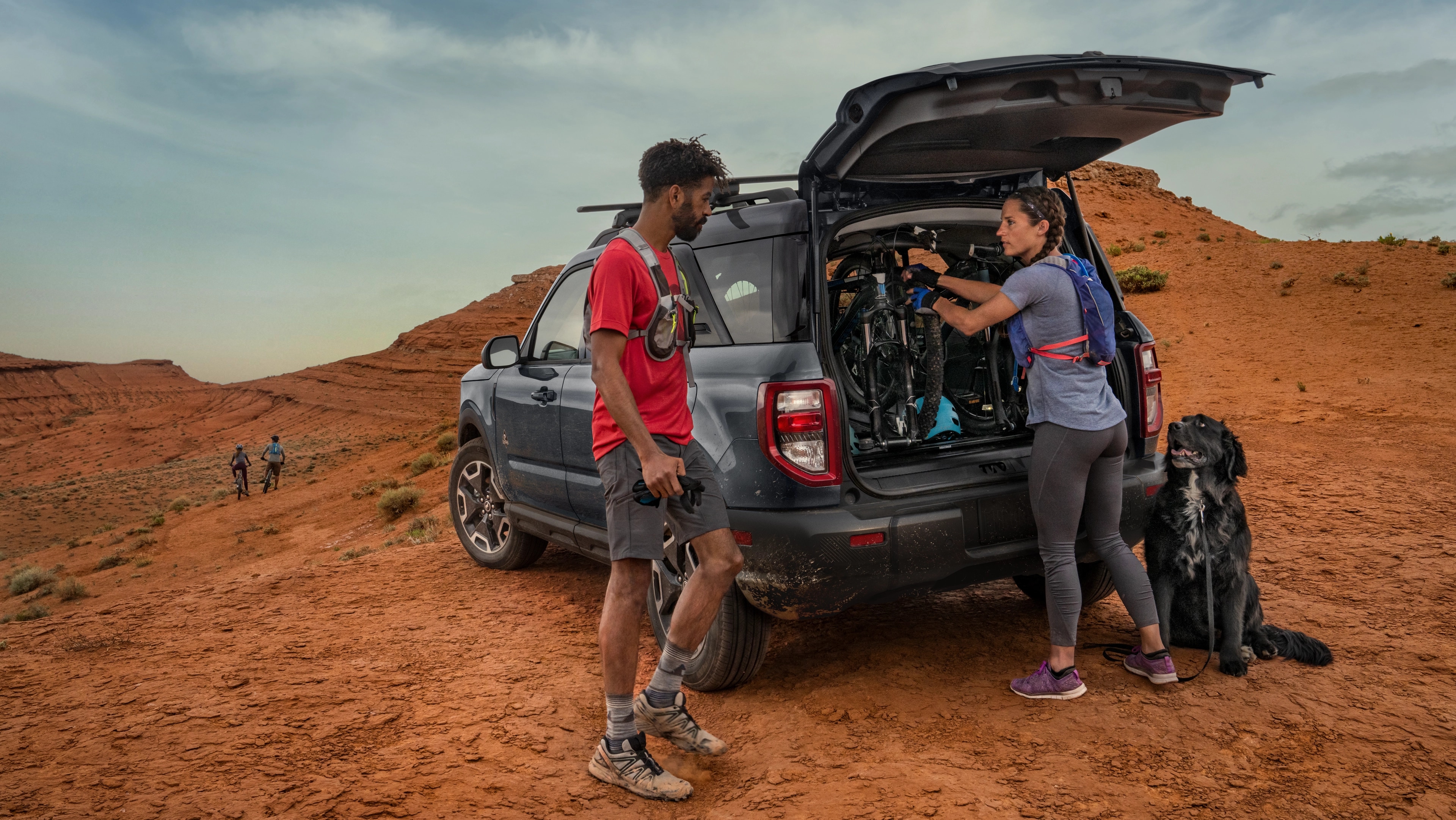 2025 Ford Bronco Sport® with back open and two people standing outside the vehicle